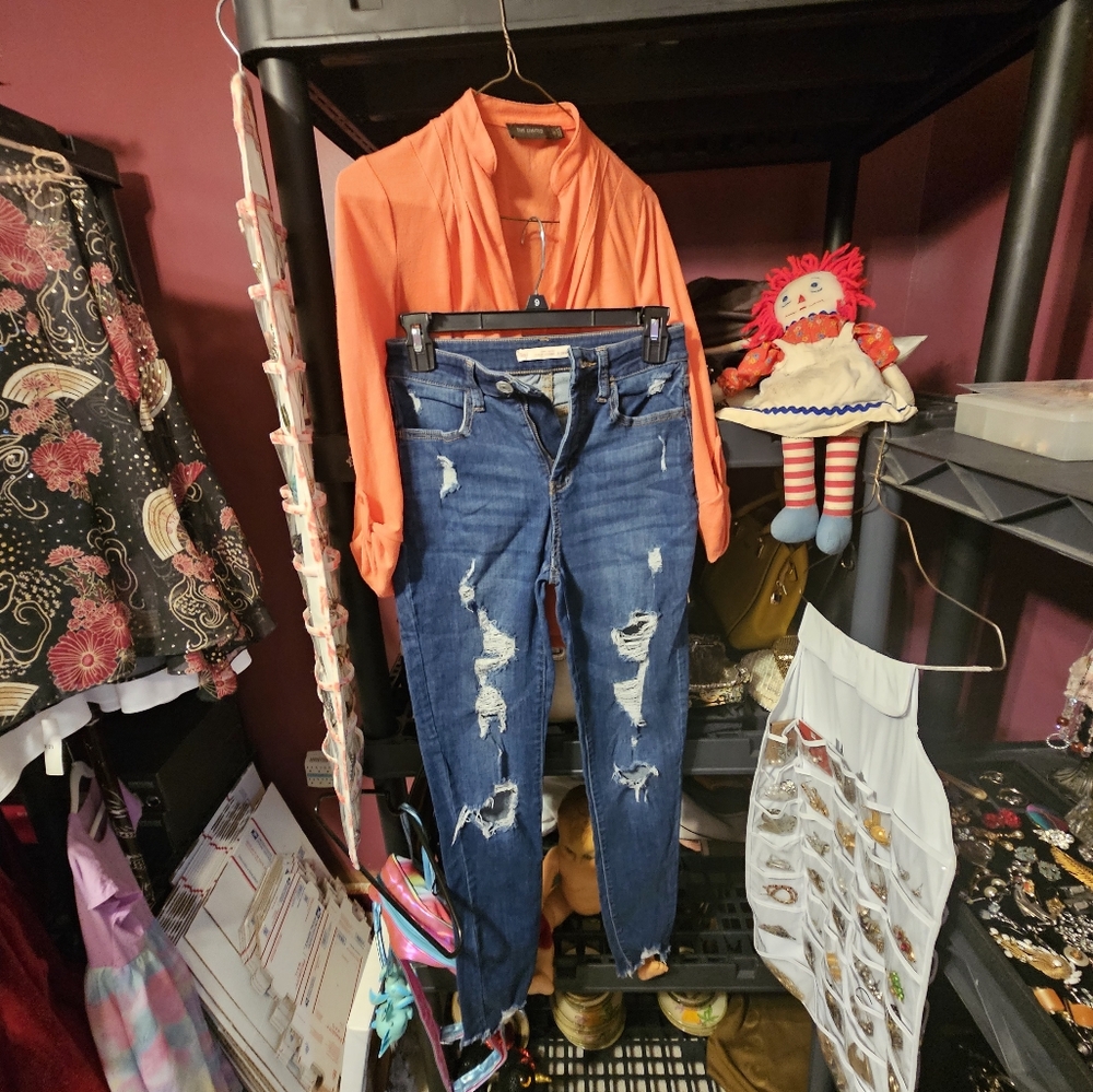 Distressed Blue Jeans With Orange Top
